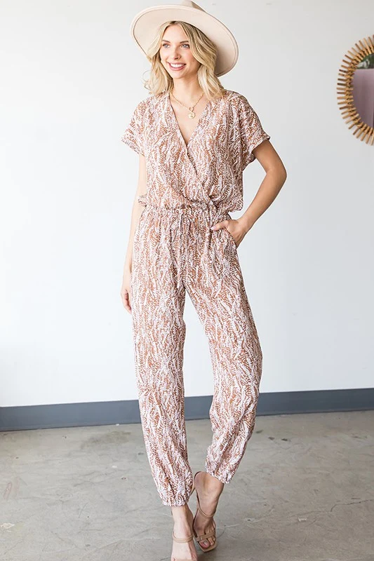 TAUPE PATTERN PRINT SHORT SLEEVE JUMPSUIT FEATURING SURPLICE BODICE